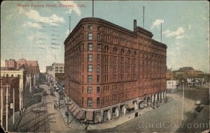 A historic postcard of the exterior of the Brown Palace Hotel.