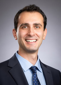 Orkun Baycik, PhD, Assistant Professor of Business Information and Analytics at the Daniels College of Business at the University of Denver, smiling in a professional faculty headshot.