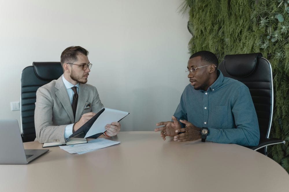 Two people discussing conflict at work