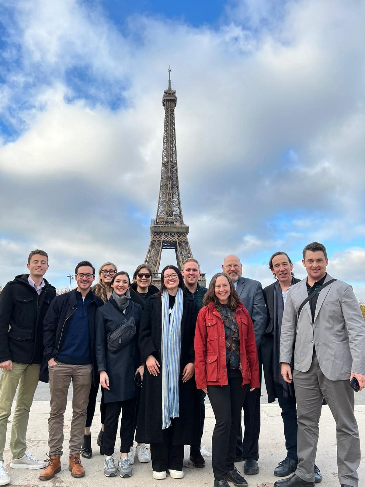 The MBA cohort poses in front of the Eiffel Tower