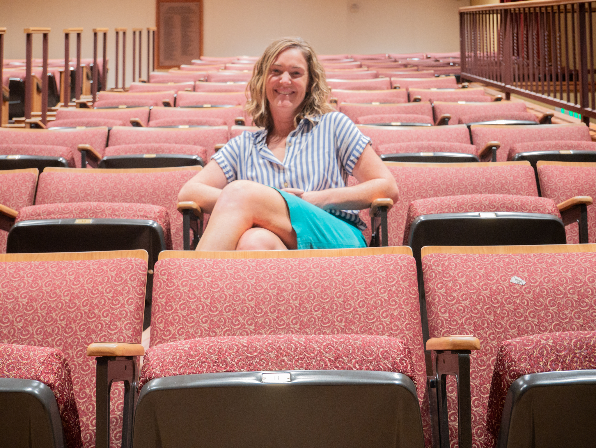 Kate Dillon seated in theater chairs