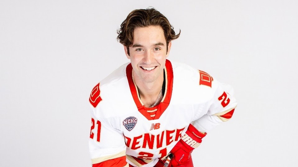 Kent Anderson smiling in a hockey jersey