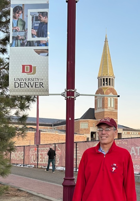 Larry Tomsic in front of Williams Tower