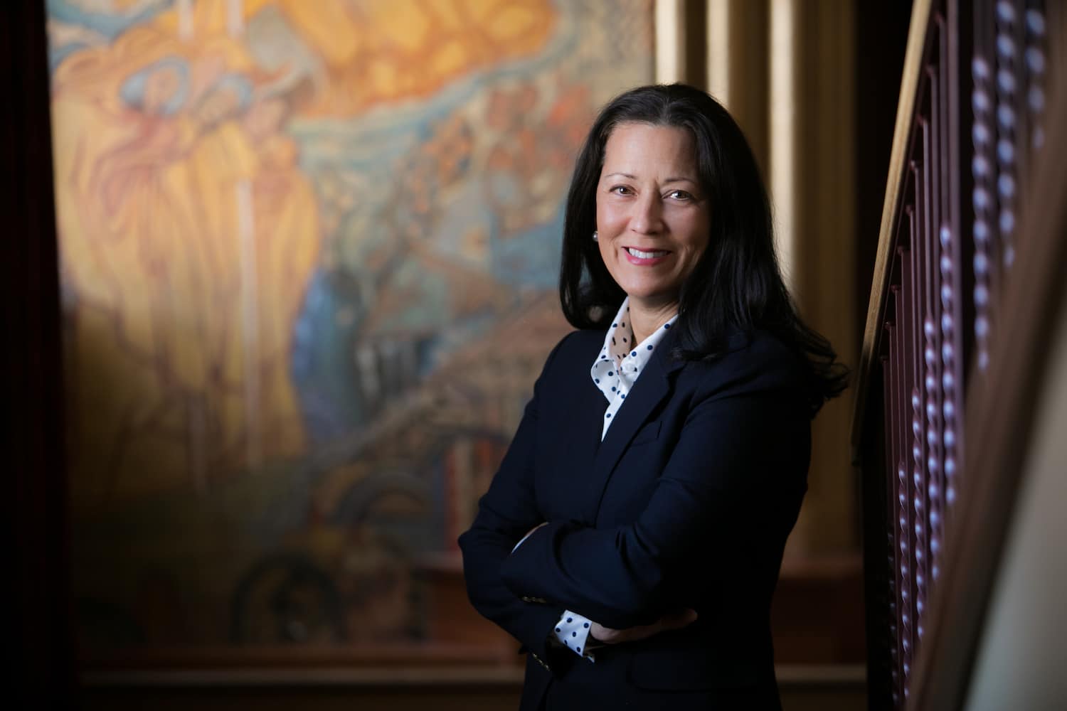 Aimee Hamilton, Assistant Professor of Management at the Daniels College of Business, University of Denver, shown in a professional faculty portrait.