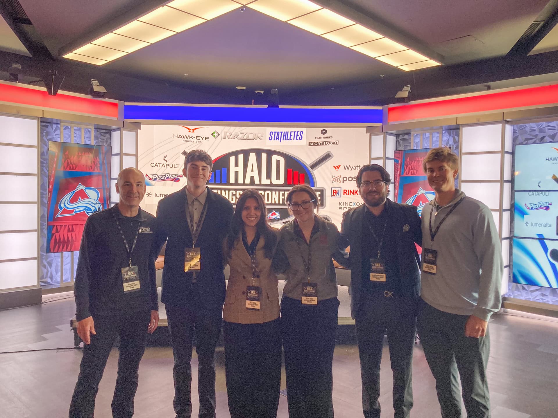 Daniels students at a business analytics conference
