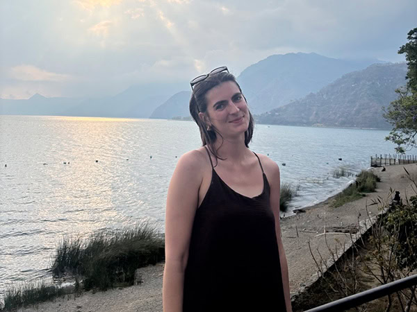 Woman on a beach at sunset